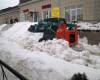 Снегоуборочная машина убирает снег 12 марта 2014