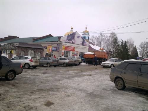 Камаз вывозит снег 12 марта 2014